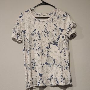 White and blue floral blouse